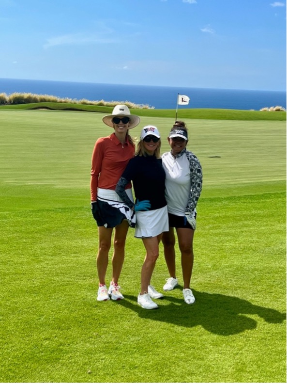 3 women posing on golf course in Hawaii 